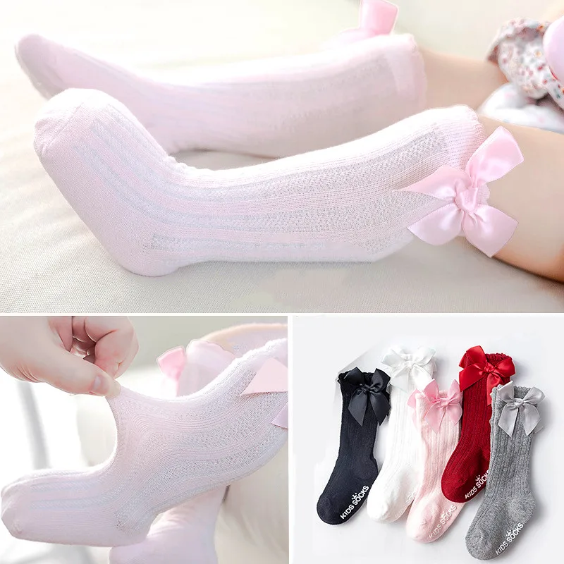 White Mesh Baby Socks with Bows Non-Slip Comfort for Newborns — view 1
