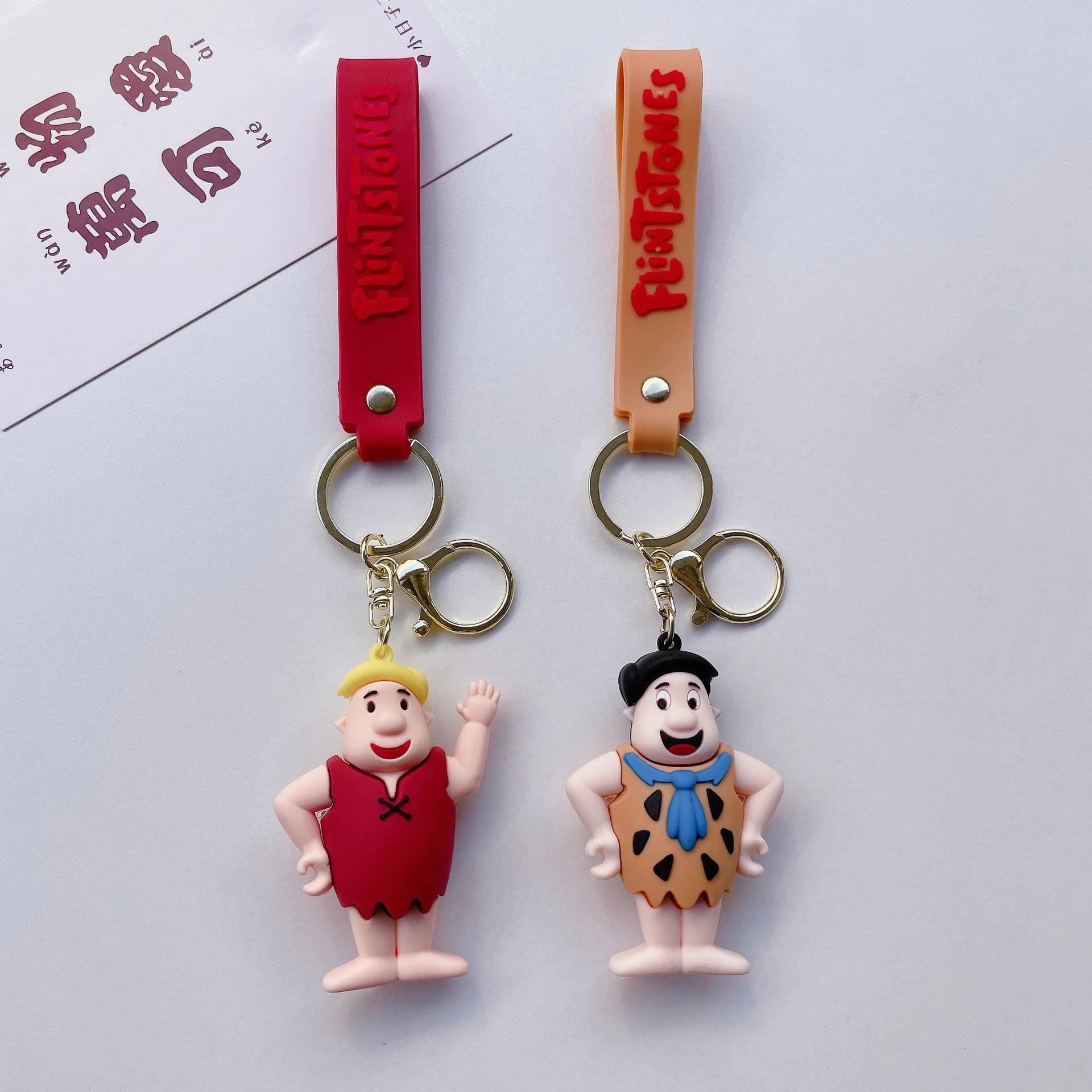 Creative cartoon modern primitive keychain doll cute couple backpack car pendant small gift wholesale