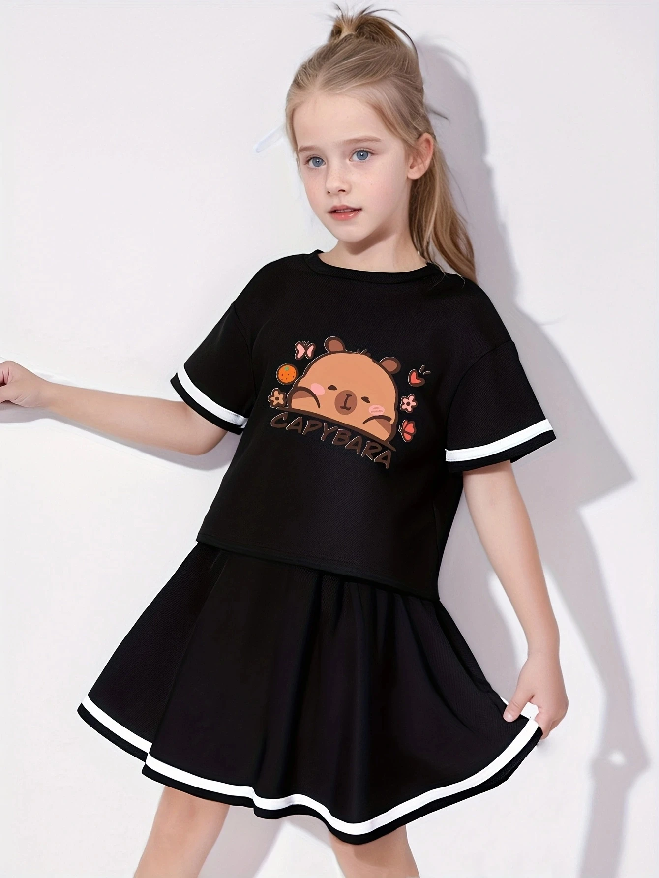 

Summer new girls' sports style two-piece set, pleated skirt+short sleeved T-shirt, Capibala print, simple and versatile