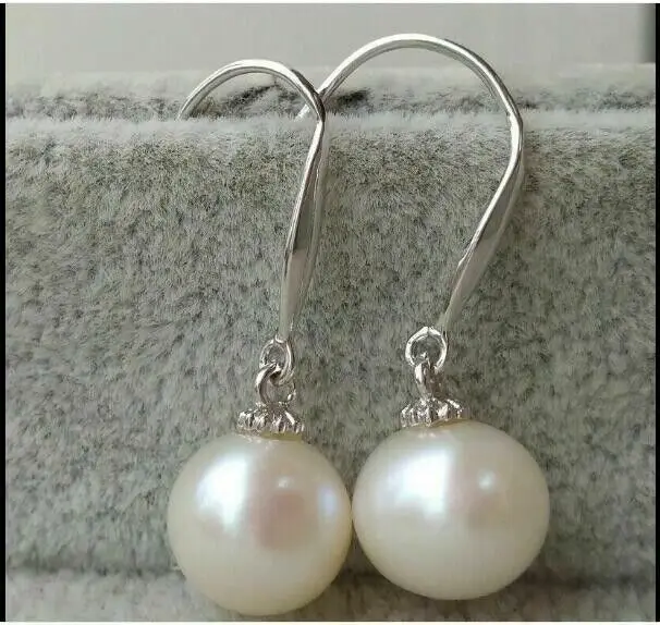 

New AAAA 8-9mm natural round South Seas white pearl earrings with 14kp Gold