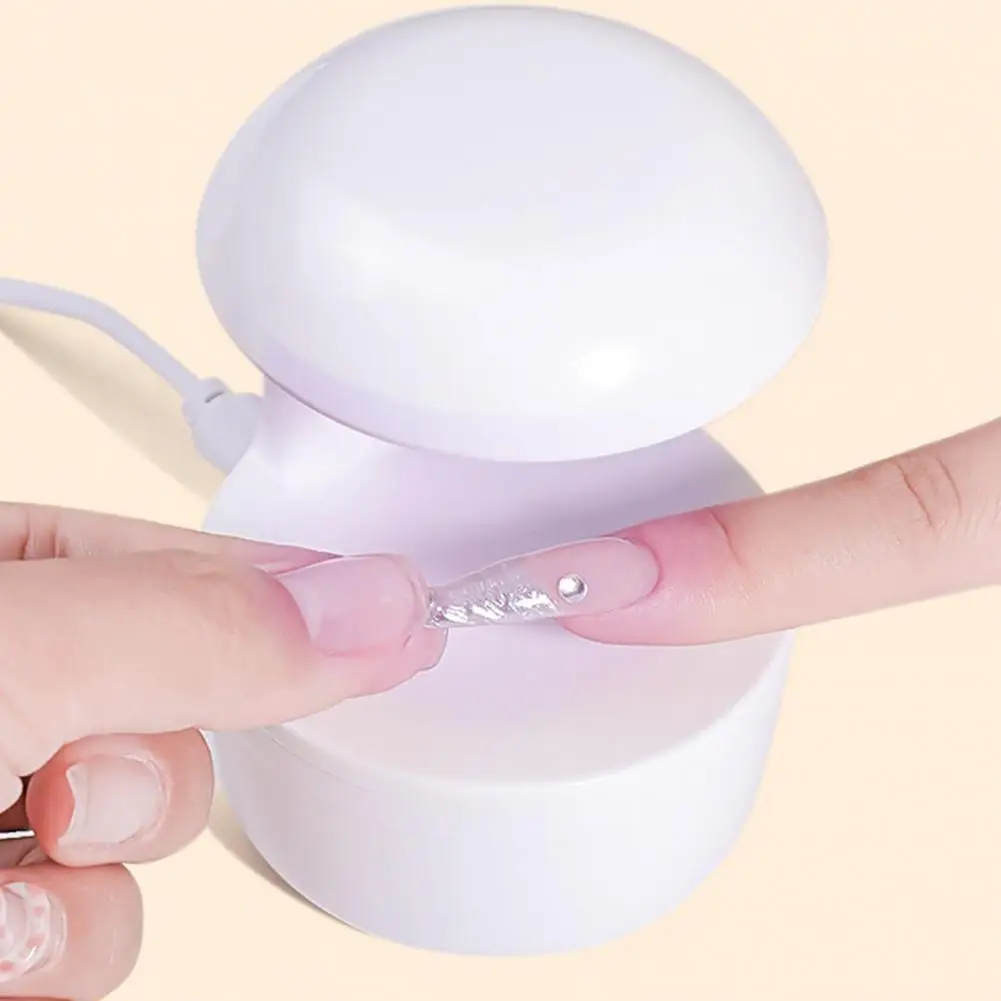 Nuova lampada per l'asciugatura delle unghie lampada UV 7LED Mini asciugatrice per unghie lampada UV macchina per Manicure con cavo USB asciugatrice per smalto Gel uso domestico da viaggio