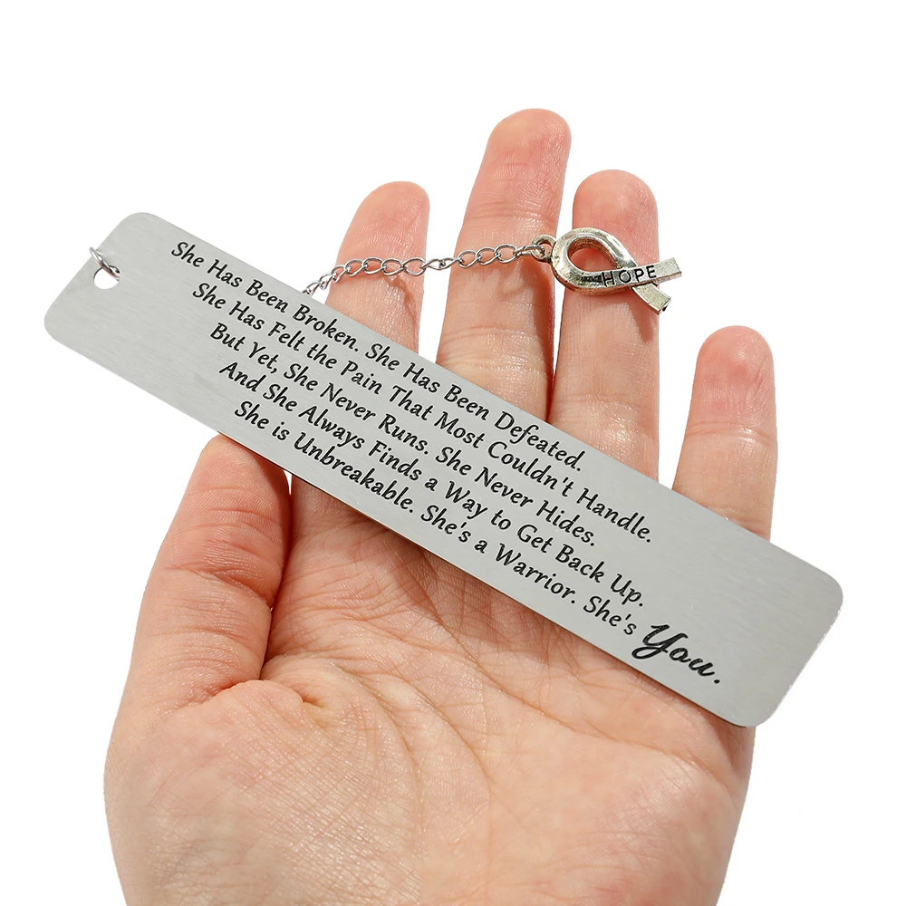 

Inspirational Stainless Steel Bookmark with "HOPE" Ribbon Charm - Empowering "She's a Warrior" Quote.