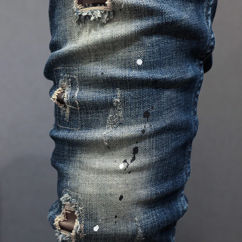 Newly Designer Fashion Men Jeans Retro Black Blue Elastic Slim Fit Painted Ripped Jeans Men Patched Vintage Denim Pants Hombre