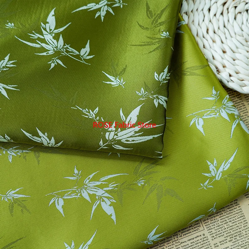 1 metr tkaniny żakardowej w stylu chińskim z zielonymi liśćmi bambusa, materiał do szycia garniturów, sukienek, kamizelek, woreczków, DIY