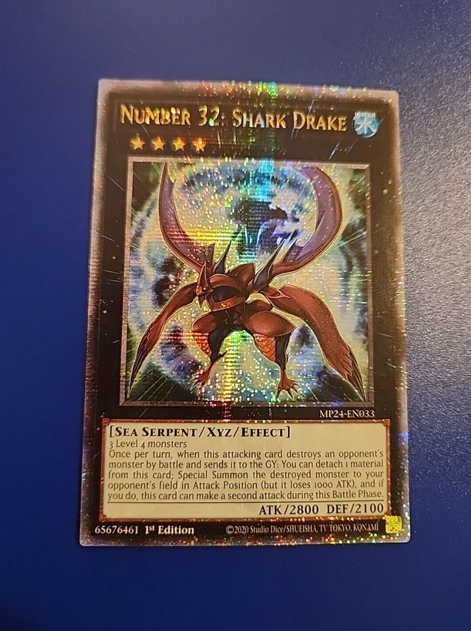 

Yugioh KONAMI TCG MP24-EN033 Number 32: Shark Drake 25th Quarter Century Secret English 1st Edition Collection Mint Card