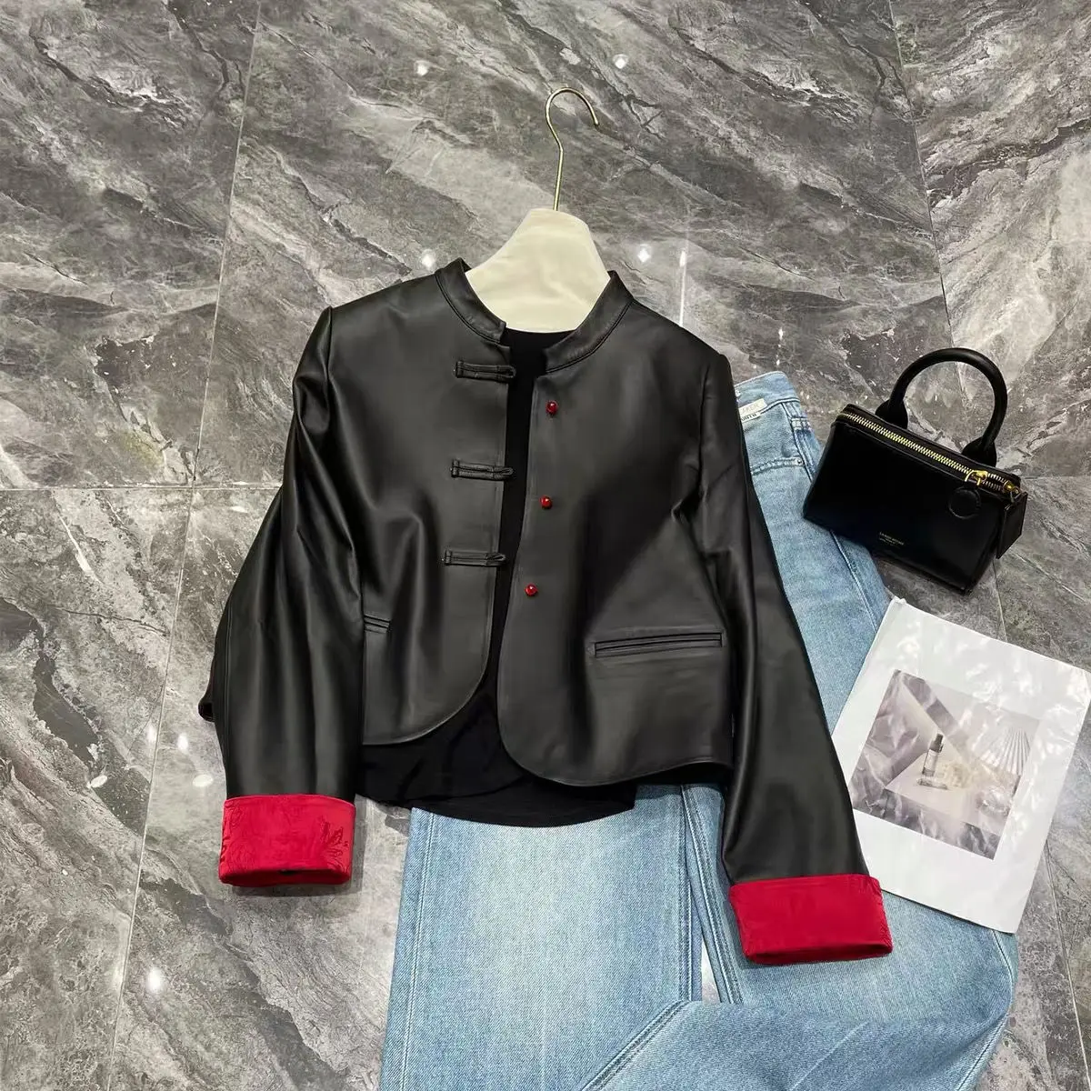 New Chinese style, high-end sense, super good-looking black leather jacket, women's 2025 design sense niche top