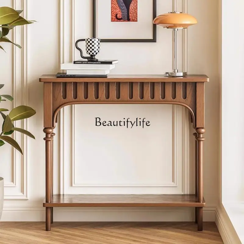 

French medieval entrance table side cabinet retro solid wood high feet against the wall opposite the door