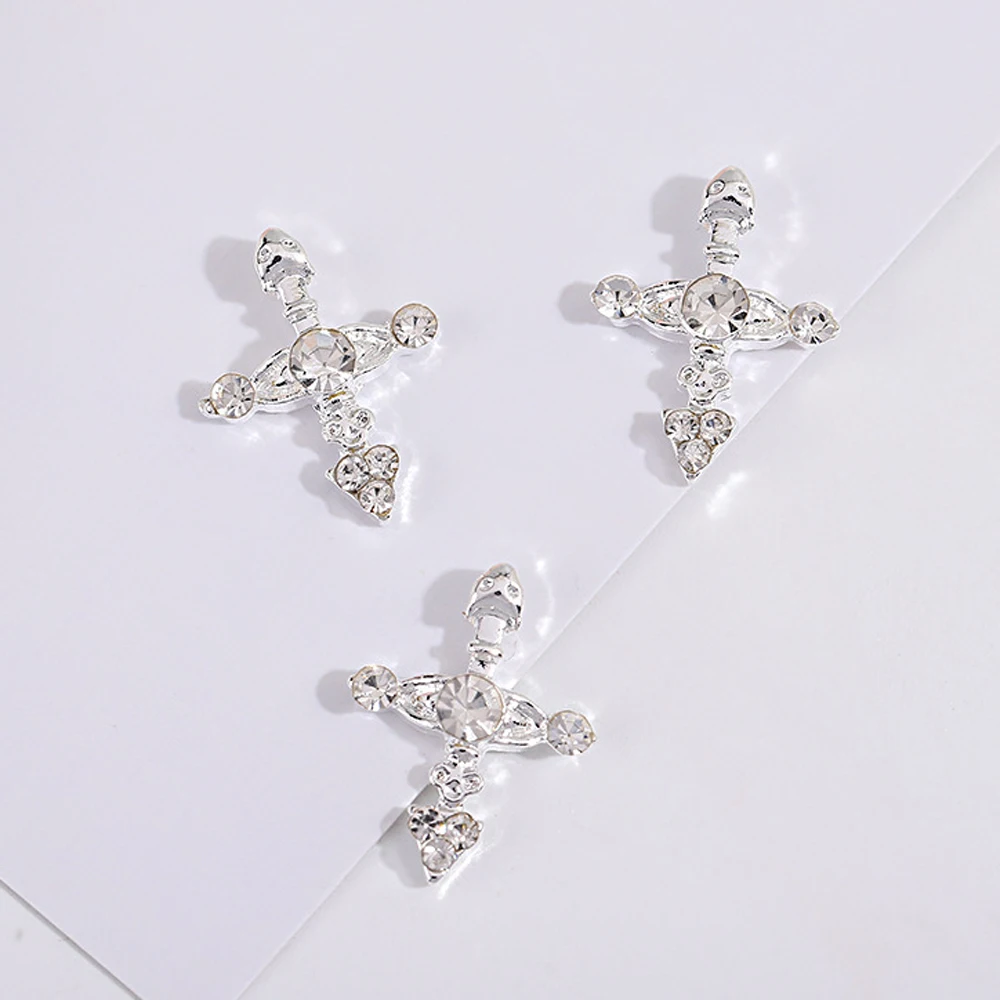 10 sztuk cyrkon Punk Cross Nail Art Charm 3D błyszczący kolorowy diamentowy krzyż części biżuterii do paznokci DIY luksusowe akcesoria do Manicure