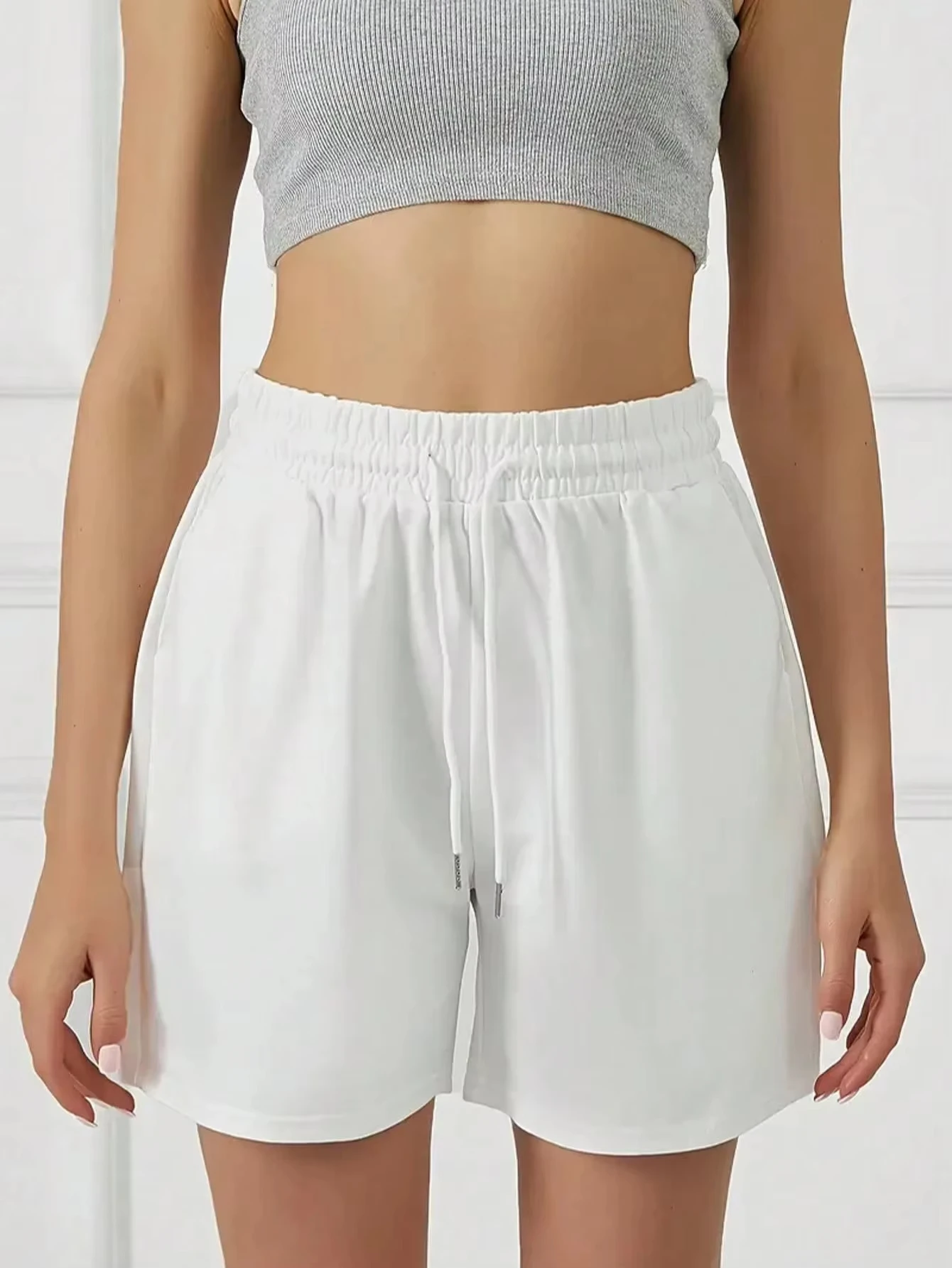 شورت كاجوال بلون موحد مع رباط وخصر مطاطي شورت للجري واللياقة البدنية للنساء ملابس نسائية لجميع المواسم