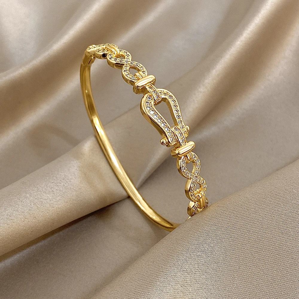 

Freetry Luxury Gold Plated Inlaid Zircon Irregular Bracelet for Women Elegant Horseshoe Buckle Infinite Symbol Open Bangle Gift
