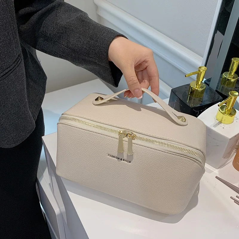 bolsa-cosmetica-portatil-feminina-de-couro-pu-a-prova-d'agua-com-grande-capacidade-e-compartimentos-para-armazenamento-de-cosmeticos-portatil
