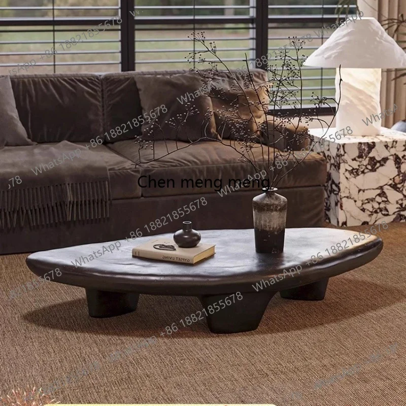 

Medieval wabi-sabi wind pebble creative retro living room oval special-shaped minimalist black coffee table table