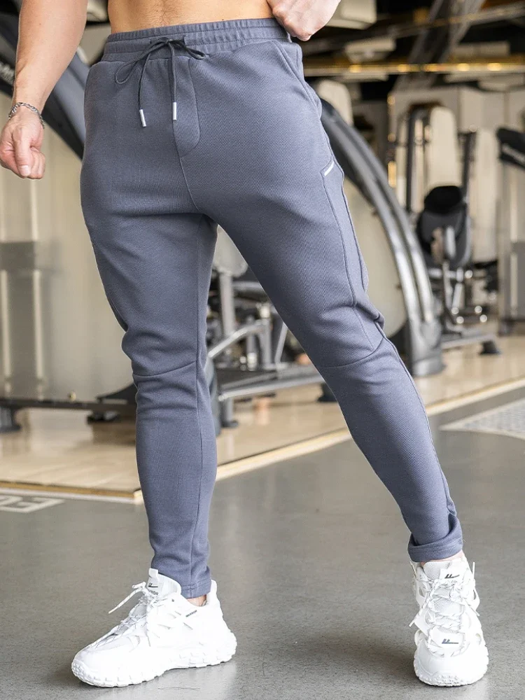 Higher Quality Man Training Wear Long Pants Men's Sports Fitness Casual Slim Stretch Running Sweatpants Winner Trousers Outdoor