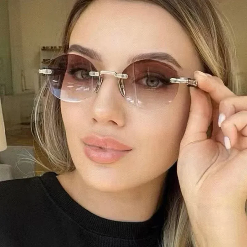 

2025 New Frameless Cut Edge Oval Fashionable Metal Sunglasses Women Gradient Color Sunglasses Trendy Eyewear Ocean Lens Glasses