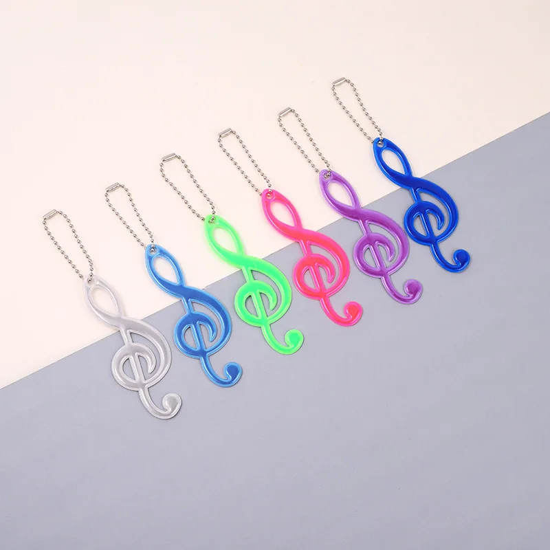 2Pcs Color Music Note PVC Reflective Pendant Kids Schoolbag Keychain Charm Night Running Cycling Luminous Warning Tag in Dark