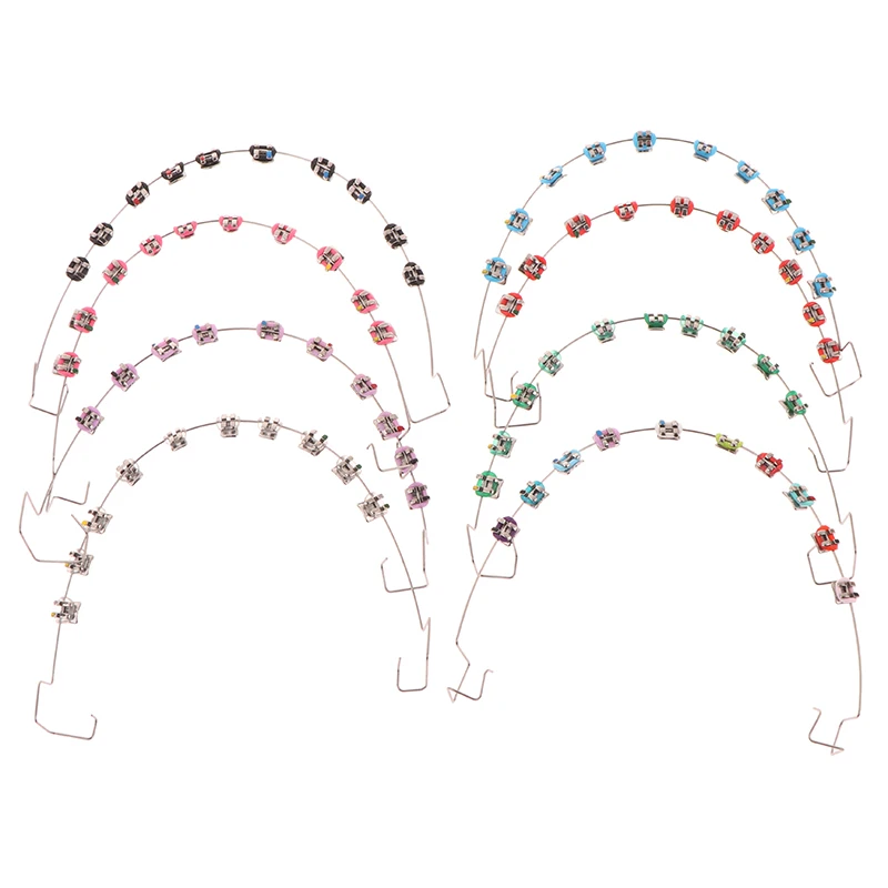 เครื่องประดับฟันชั่วคราวด้วยลวดโลหะ  ตัวยึดโลหะหลากสี และยางรัดจัดฟัน  ของตกแต่งทางทันตกรรม