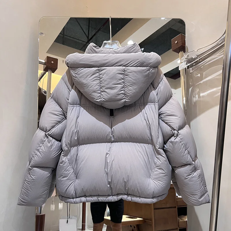 سترة سميكة دافئة بقلنسوة 2025 شتاء جديد إمرأة بطة أسفل جودة عالية لينة المرأة أسفل سترة موضة النساء باركر H742