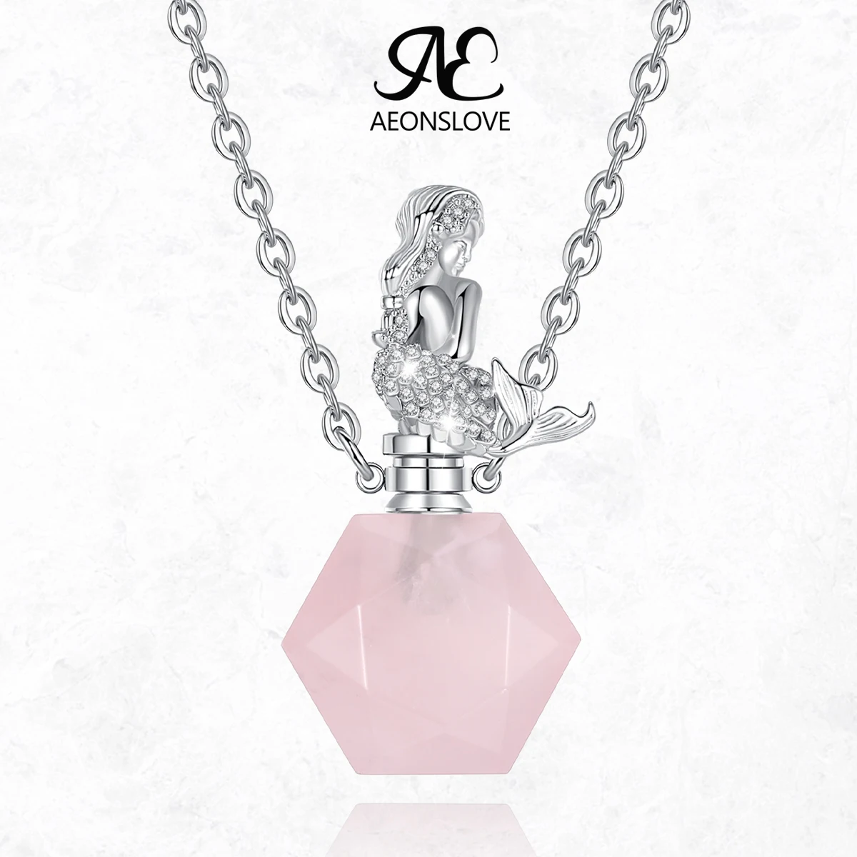 

AEONSLOVE Pink Crystal Cremation Urn Necklace Mermaid Quartz Stone Essential Oil Diffuser Pendant Memorial Jewelry Gift Unisex