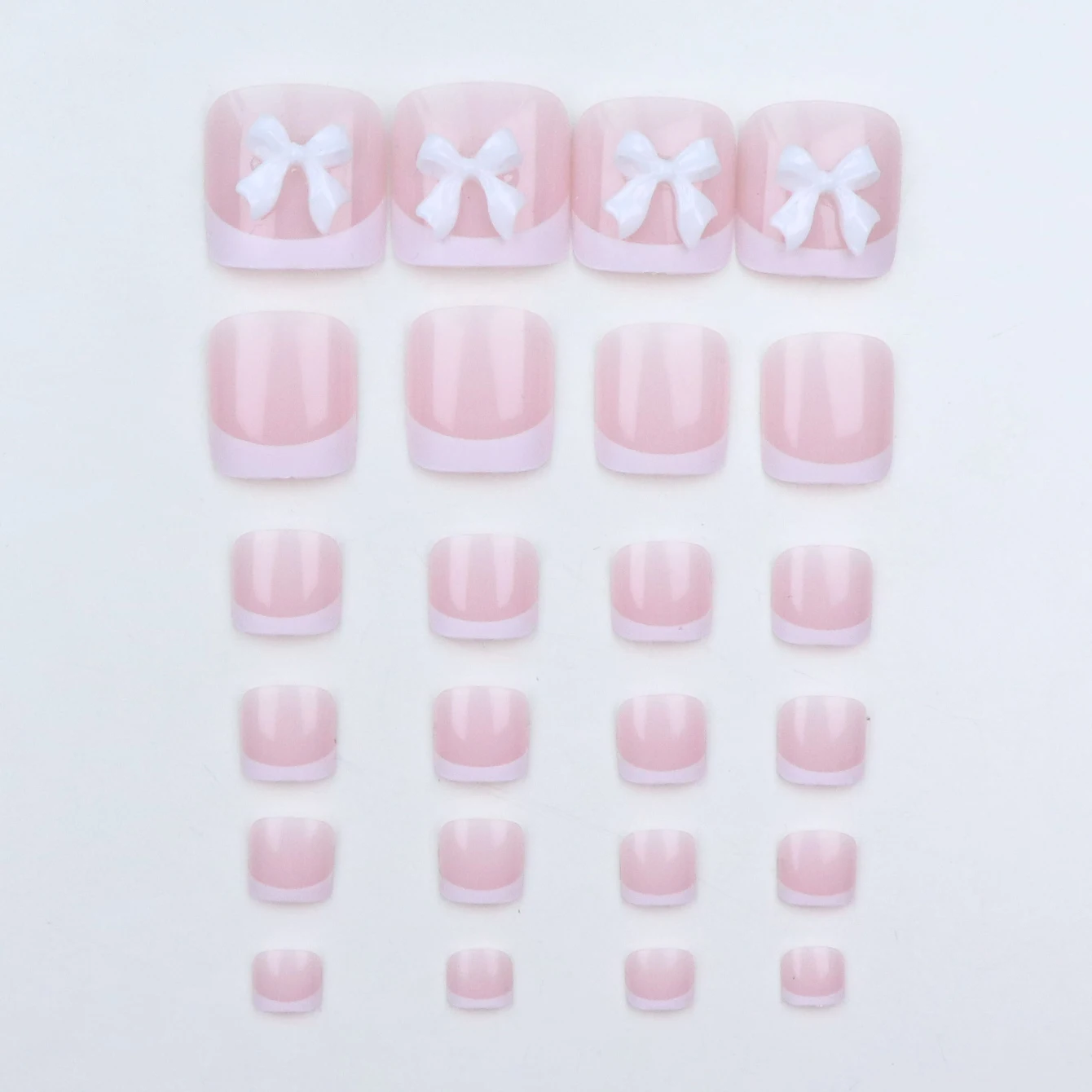 ปลายเล็บเท้าทรงแหลมสไตล์ฝรั่งเศส 24 ชิ้น สีขาว ปลายเล็บอะคริลิกปลอมแบบสั้น พร้อมดีไซน์โบว์ ปิดเต็มเล็บเท้า สำหรับสุภาพสตรี