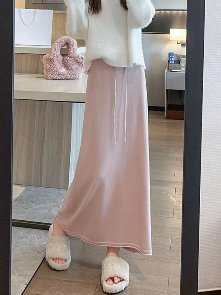 กระโปรงไหมพรมถักสไตล์เรโทรระดับไฮเอนด์ ทรงเอไลน์แบบสบายๆ สำหรับผู้หญิง กระโปรงทรงห่อแบบลำลอง ใส่ได้ทั้งฤดูใบไม้ร่วงและฤดูหนาว บุด้วยโพลีเอสเตอร์อย่างดี ให้ความรู้สึกสบาย