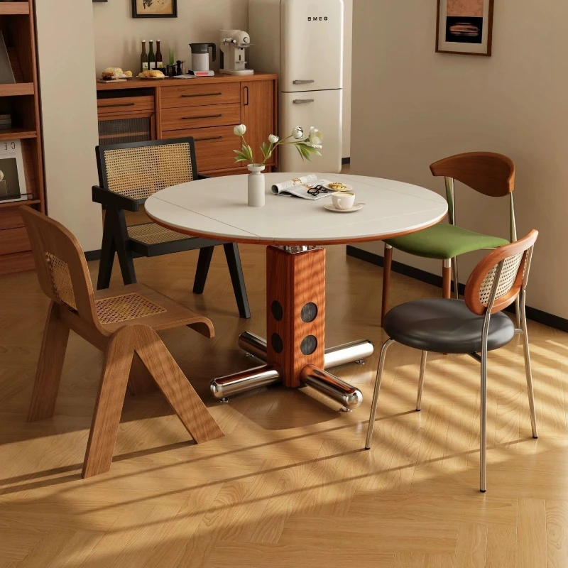 

Round simple retro rock slab medieval dining table household metal small apartment solid wood