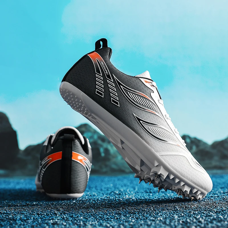 

New Men Women Track Field Events Cleats Sprint Shoes Athlete Short Spikes Running Sneakers Training Racing Sport Shoes Size34-44