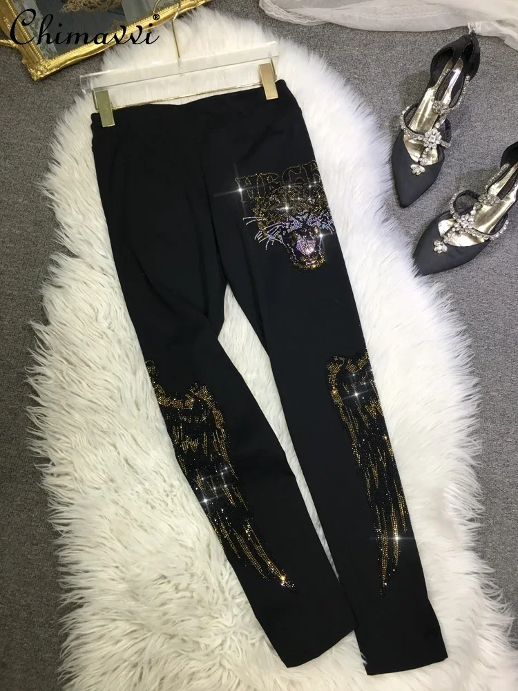 

Autumn and Winter European Heavy Hot Diamond Leggings Women's High Waist Black Tiger Head Wings Tight Shark Small Feet Pants