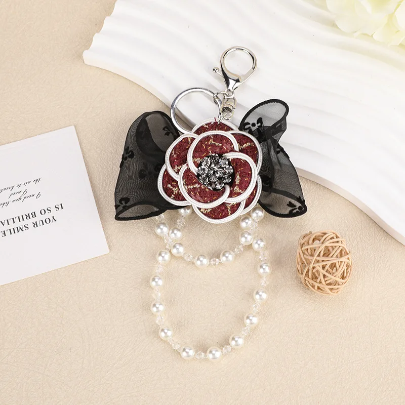 camellia keychain Bow Bag Pendant Keychain Fashion Pearl Chain Korean Car Keychain Women's Circle