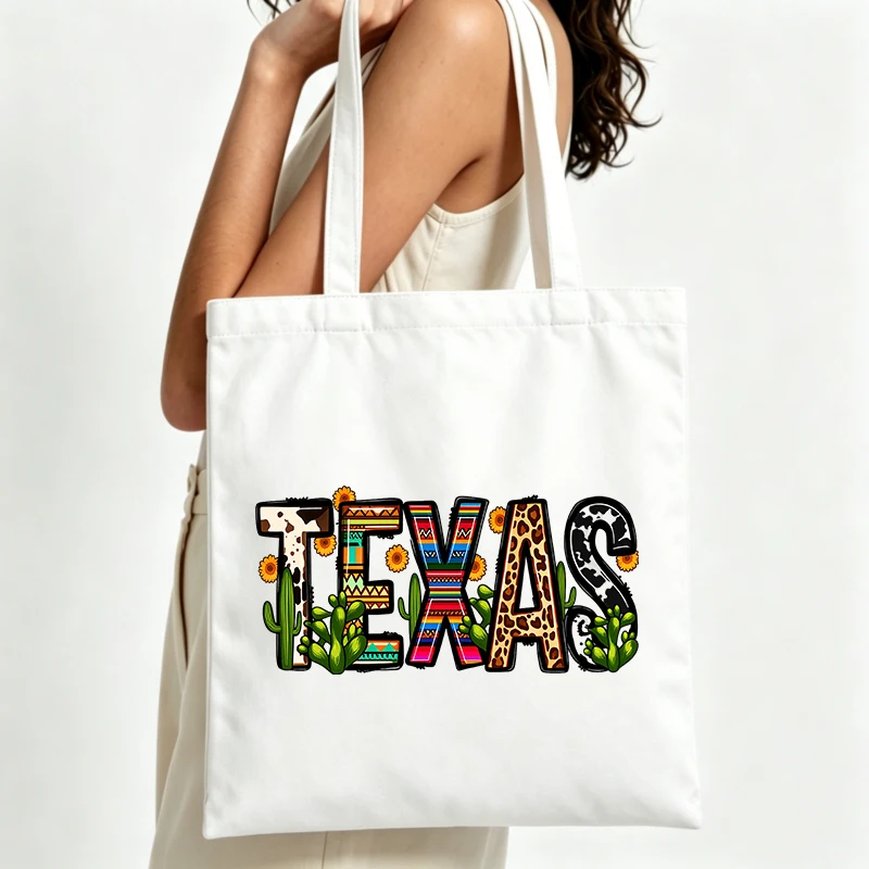 Texas typography canvas tote bag with cactus and floral graphic, ideal for casual daily use and summer outings