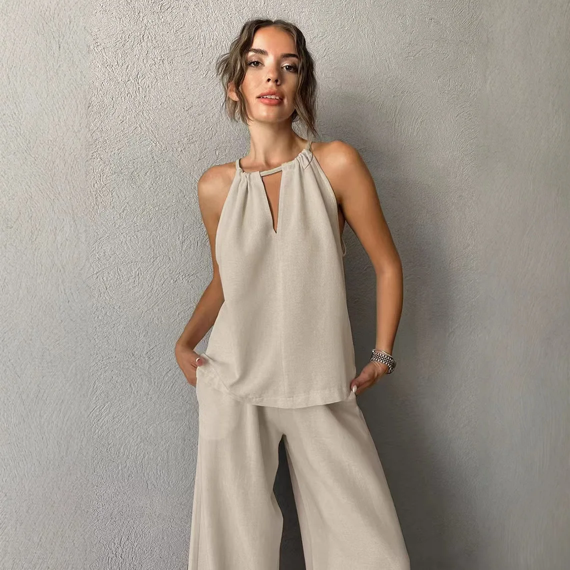 

A New Cotton and Linen Set for Spring and Summer 2025 Featuring Vacation Style Off-the-neck Vest and Long Pants Two-piece Set