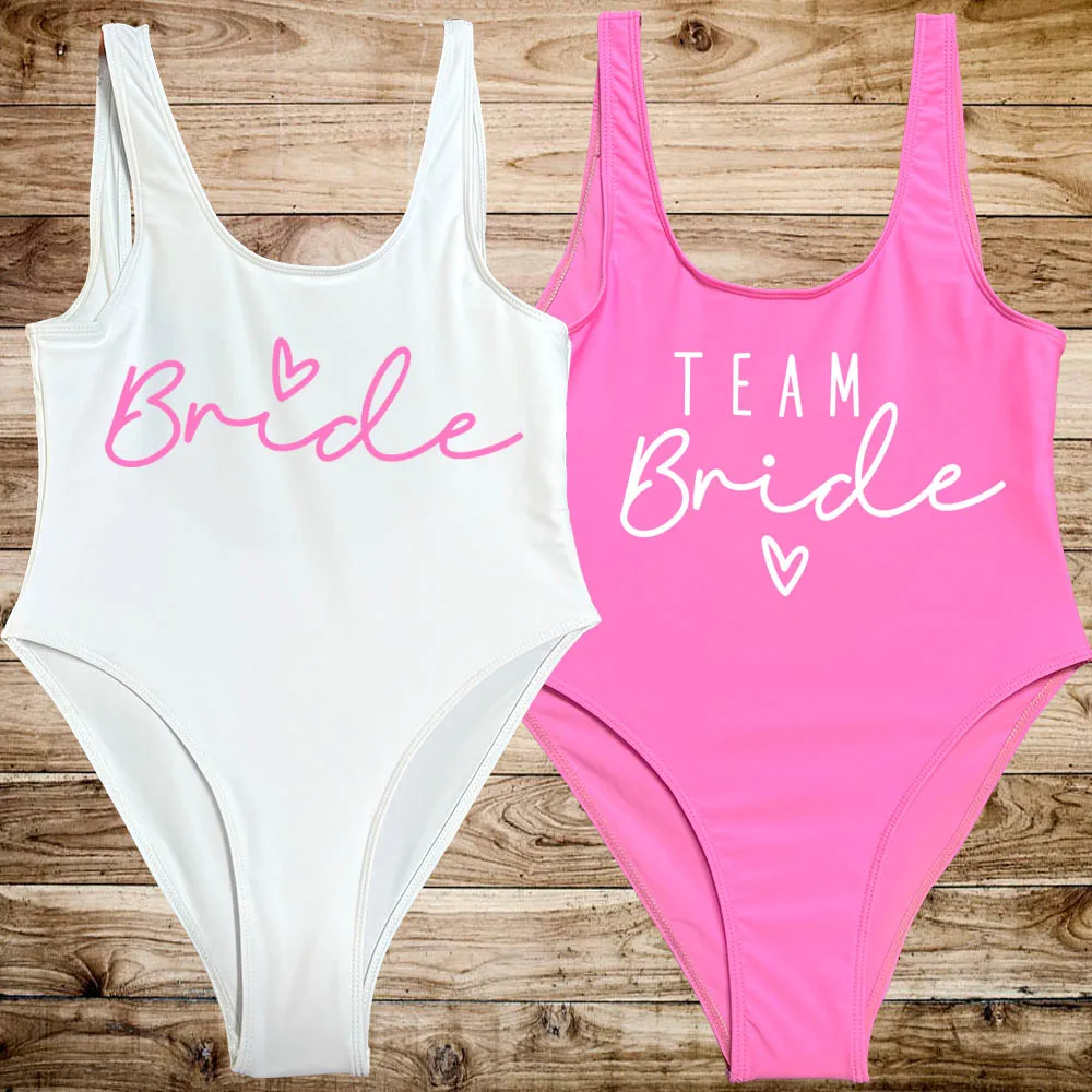 

Pink TEAM Bride Heart Print One Piece Swimsuit Women Swimwear High Cut Low Back Sexy Bodysuit Bachelorette Party Bathing Suit