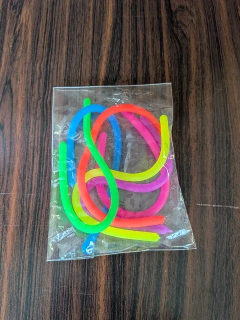 6 Pack Stretchy String Noodles Sensory Fidgets Toys Resistance Squeeze Strengthen Arms Stress Reliever Toys for Kids Adults photo review