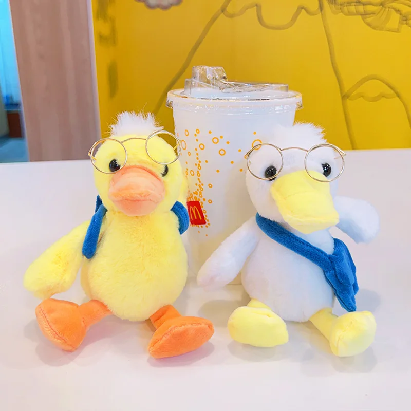 Animais de pelúcia Chaveiro de pelúcia Óculos fofos Brinquedos de boneca de pato Pingente de mochila Saco Keychain Acessórios de livros Saco de livro