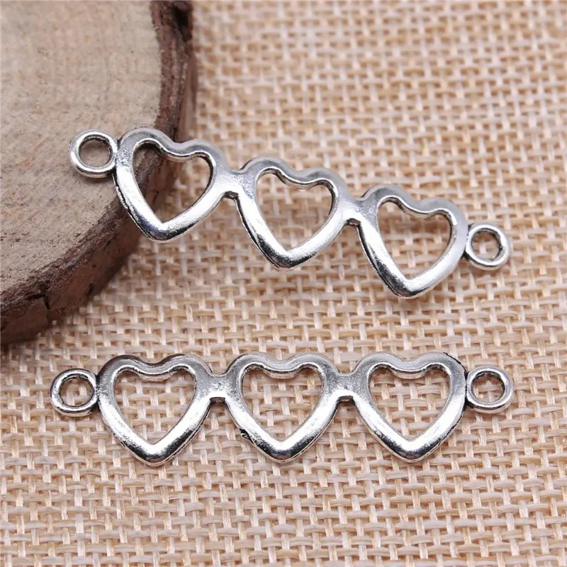 150 Stück antiksilberfarbene Herzverbinder 43 x 11 mm für DIY-Schlüsselanhänger, Halsketten, Armbänder, Schmuckherstellung im Großhandel – Detail 3