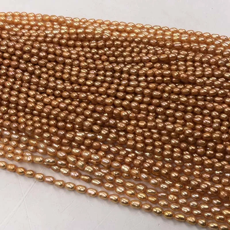 

ELEISPL JEWELRY Wholesale 20 strands Near Orange Color Freshwater Pearl Rice 6*7-8mm #22010334-2