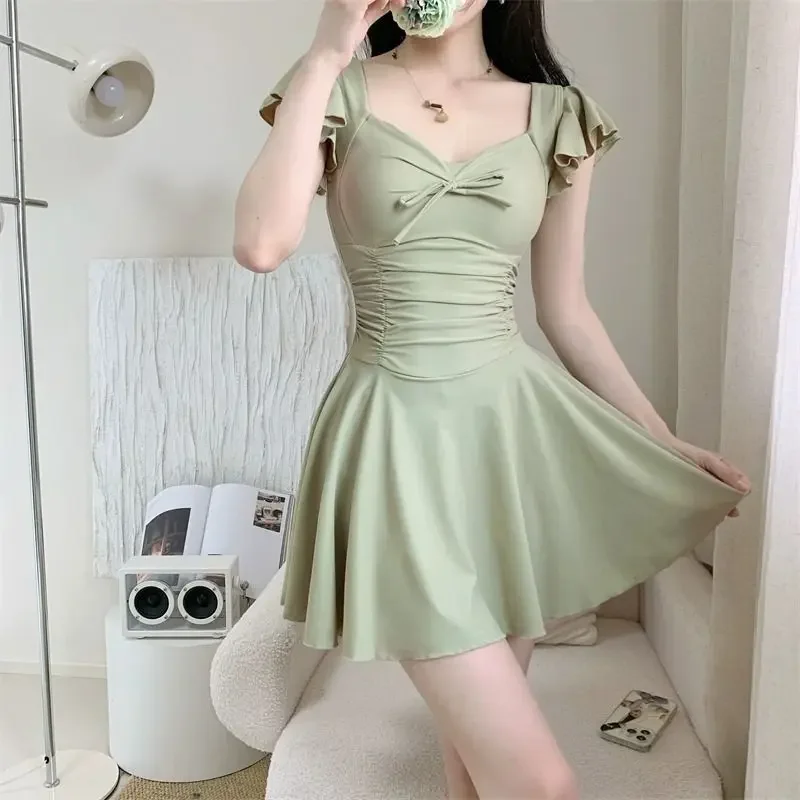 Traje de baño conservador de una pieza para mujer, cubierta de carne, adelgazante, estilo coreano, estilo de hadas, pecho pequeño recogido, vacaciones de primavera caliente