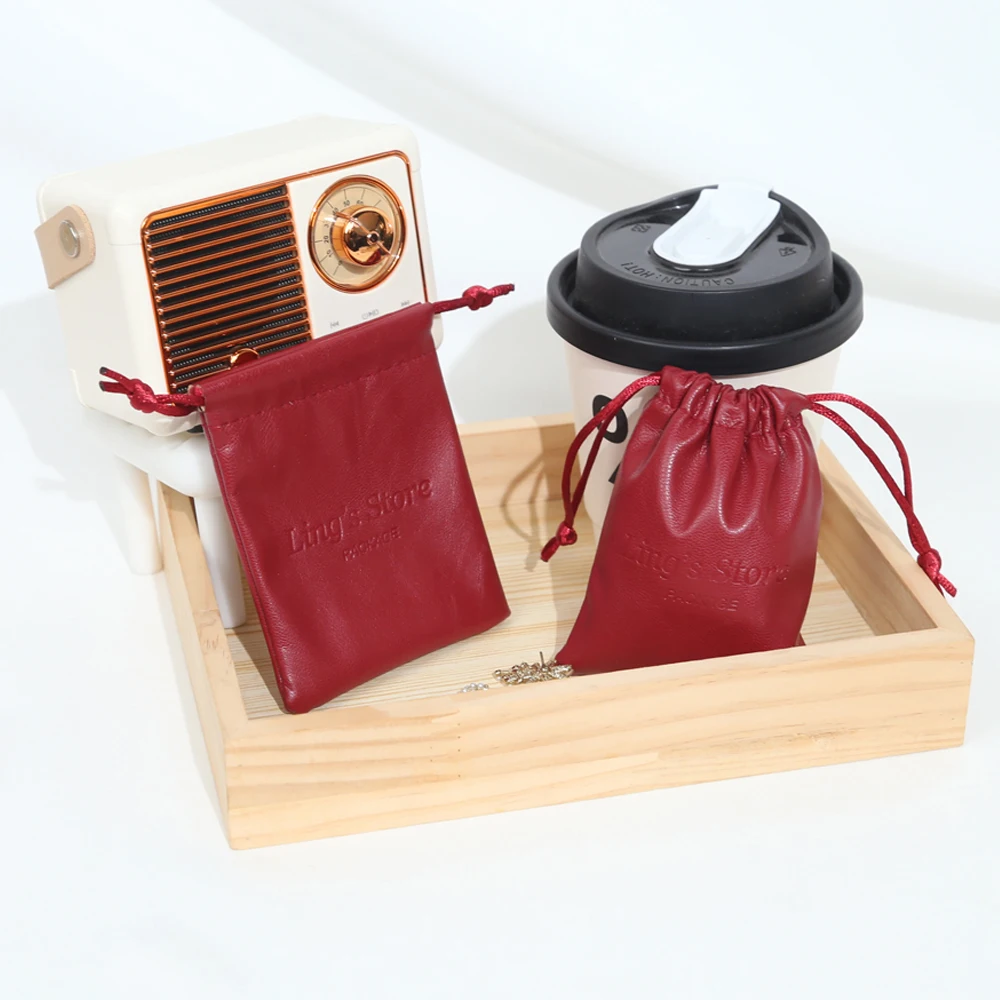 50/100 шт. шикарные индивидуальные ювелирные изделия из искусственной кожи, сумка на шнурке, подарочная упаковка, сумки для сережек, косметический органайзер для париков, карман для хранения