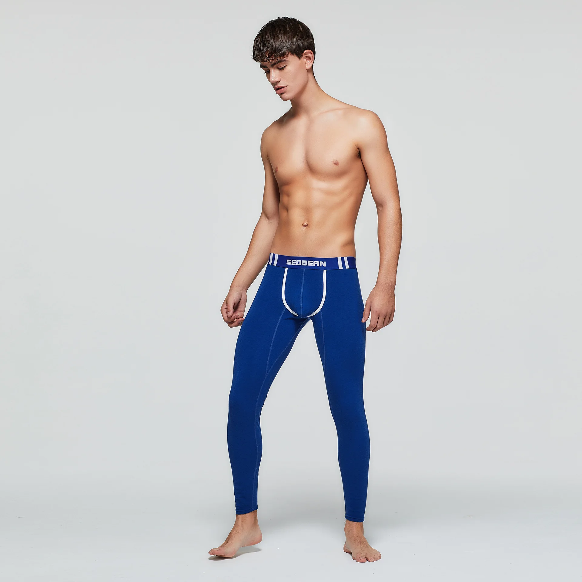 Winter men's thermal long johns spot wholesale, men's solid color slim-fitting thin leggings D90402