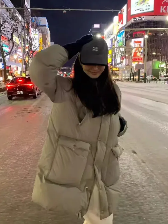 Onza 90 Du down Jaet con capucha de longitud media para mujer Color puro invierno nuevo Sle tela de nailon cálida cierre de cremallera viaje Sle