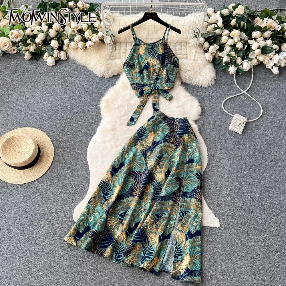 

TWOTWINSTYLE Floral Printted Vacation Two Piece Set For Women Spliced Bow Tops High Waist Hollow Out Skirt Set Female KDR524918