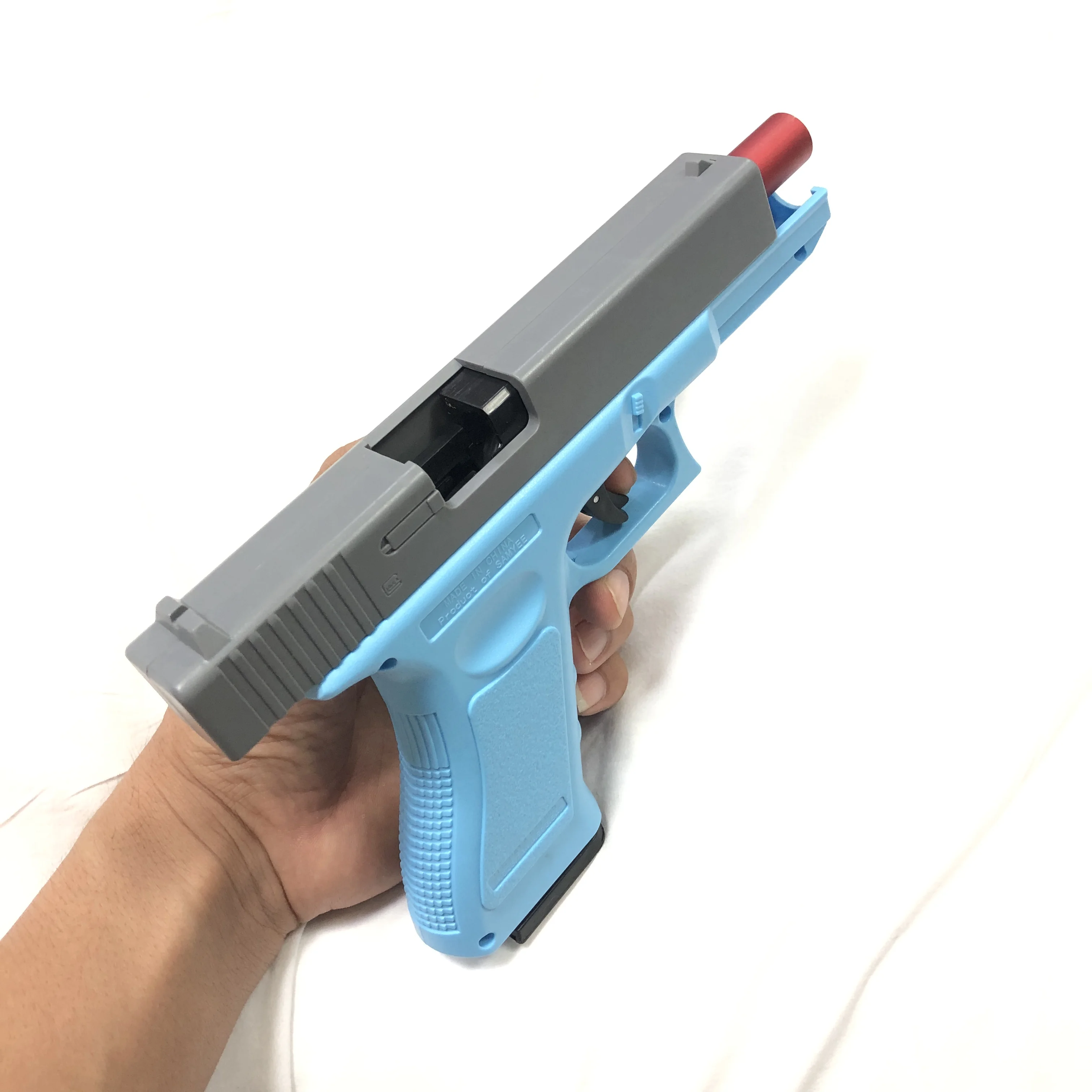 Dual-Mode ปืนของเล่น G17 เลเซอร์รุ่นอัตโนมัติยิงหัวไชเท้าปืน SHELL Ejection Soft Bullet ปืนพก CS อาวุธสําหรับเด็ก