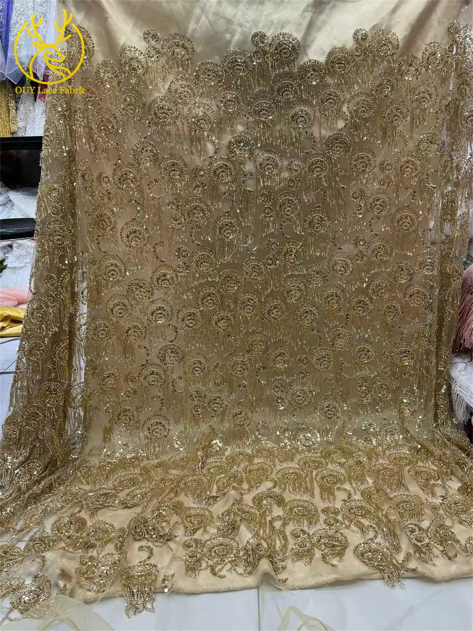 قماش دانتيل مطرز ثقيل أفريقي فاخر ذهبي ثلاثي الأبعاد 2026 قماش دانتيل ترتر فرنسي مناسب للحفلات وفساتين الزفاف المخصصة