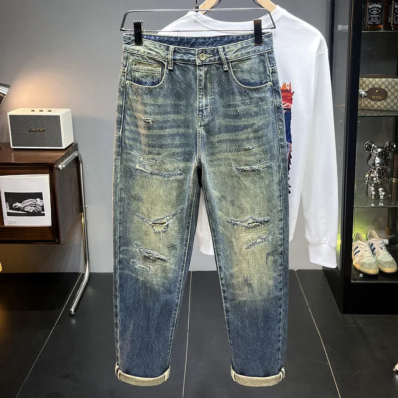 Jeans nostalgici per uomo 2024 autunno nuovi Jeans strappati retrò tendenza dritta pantaloni lunghi strappati lavati per il tempo libero versatili