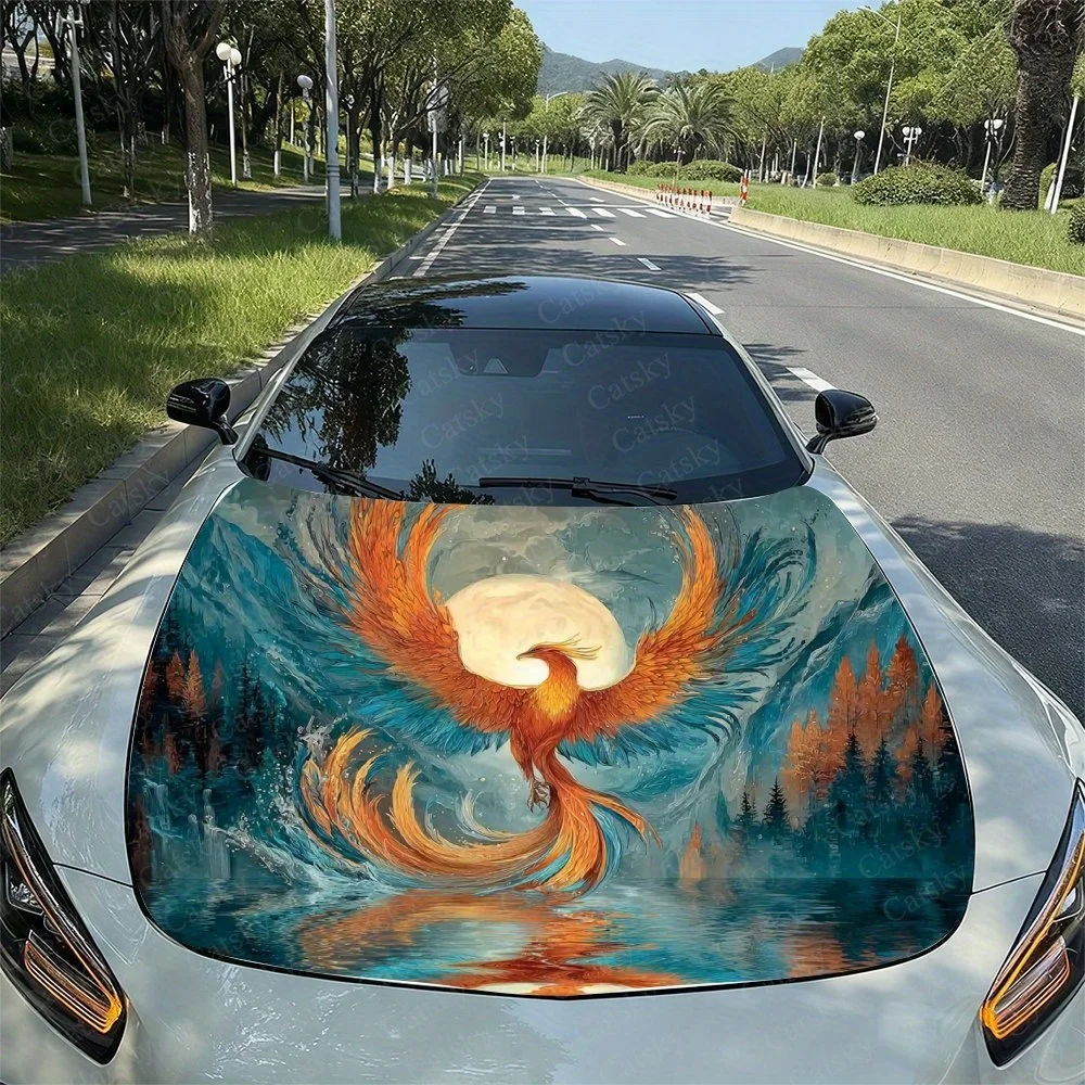Vibrant phoenix design on car hood, featuring fiery wings and serene forest backdrop. Perfect for nature and mythology enthusias