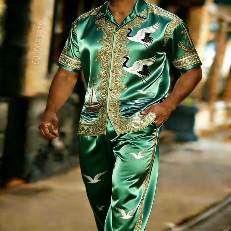 Men's luxury red satin short-sleeve collared shirt and trousers two-piece set; casual outfit featuring a gold crane and sailing