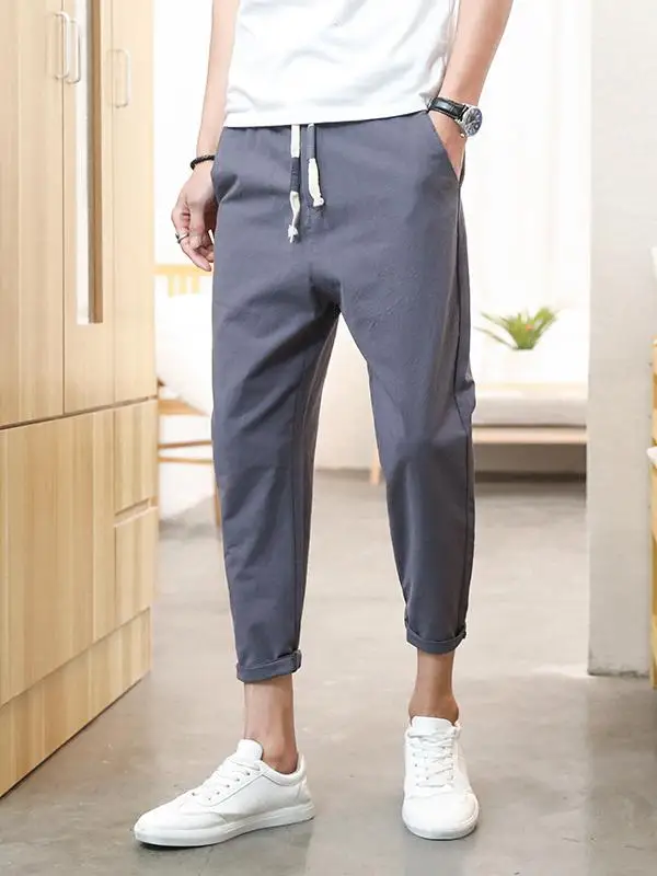 Pantaloni casual da uomo in cotone e lino slim fit Coreano Sle Student Faion Summer Nove punti Pantaloni per il tempo libero da uomo con piede piccolo