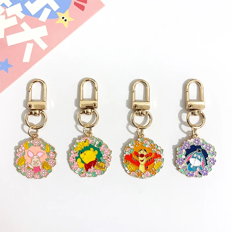 Disney Pooh Bear Piglet Tigger flor corona diseño dibujos animados llavero de Metal bolsa de maquillaje cremallera decoración colgante regalo de cumpleaños
