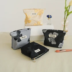 Borsa per il trucco da donna borsa per il trucco con fiocco grigio borsa per rossetto cuffie portatili portamonete pochette per pendolarismo piccola borsa di stoffa Ins