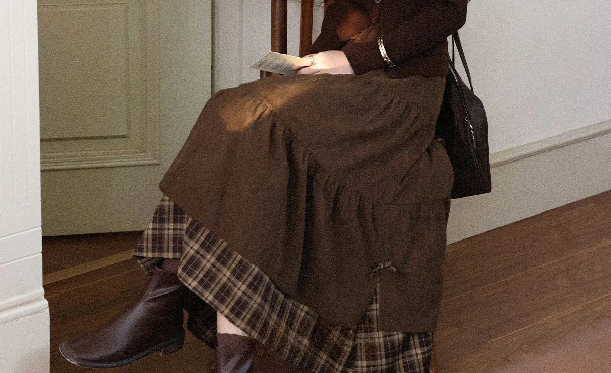 الربط منقوشة نصف تنورة طويلة 2025 الخريف والشتاء سميكة عالية الخصر التخسيس القوس ألف خط تنورة طويلة #5