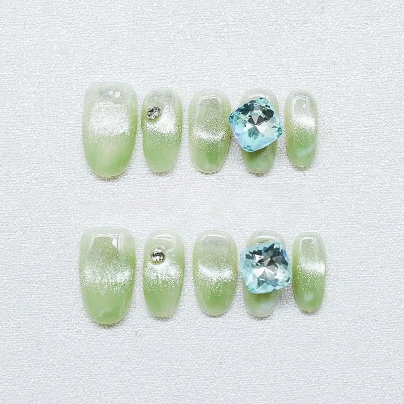 

Purely Handmade Armor, Fresh Green Fine Flash Cat Eye Stack Drill Advanced Sense White Nail Art
